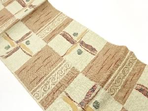 手織り真綿紬市松に抽象模様織出し名古屋帯